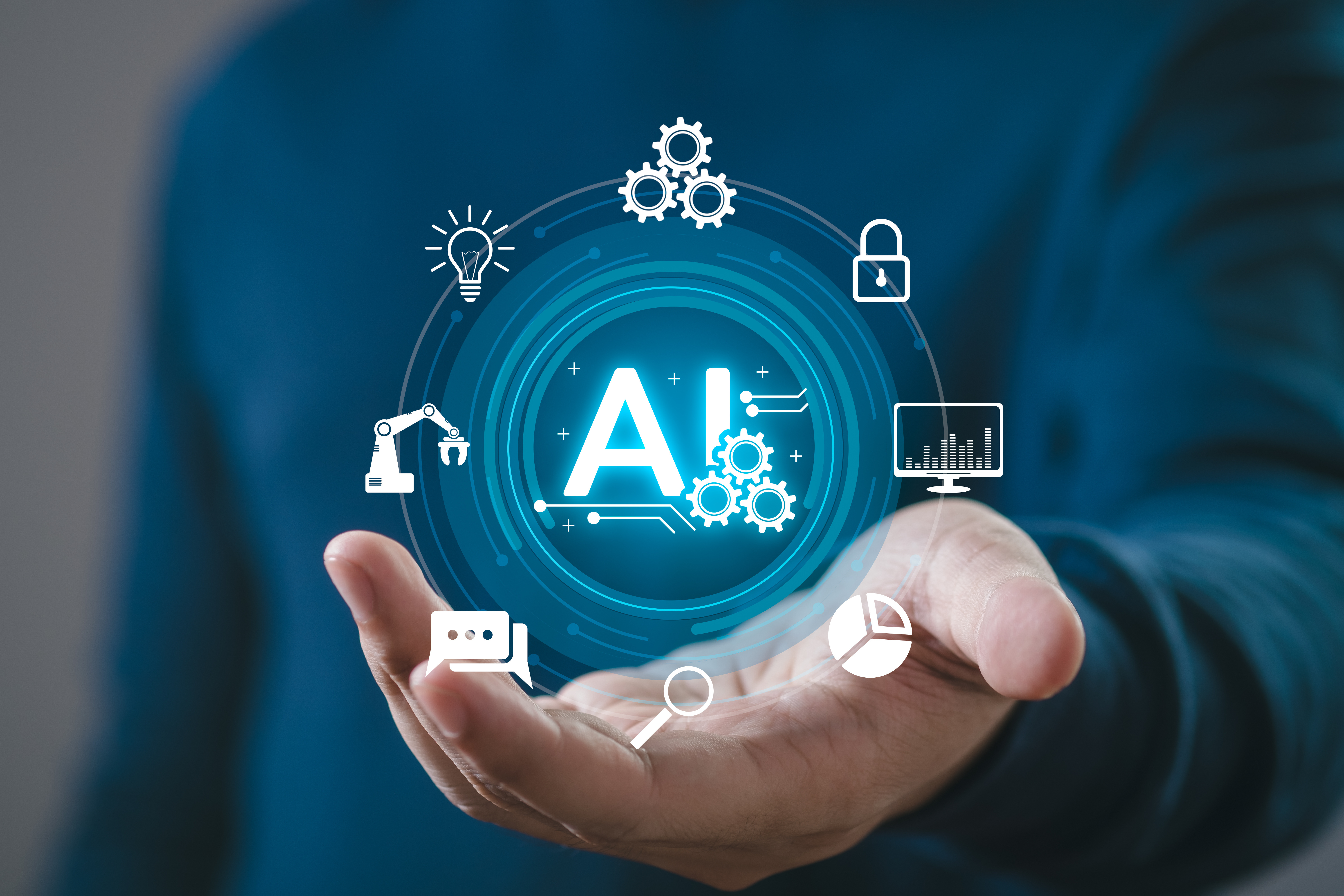 Close up of hand, palm up, with the letters AI surround by images from various sectors in the palm.