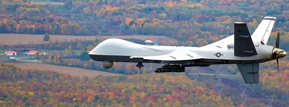 predator drone flying over forrest